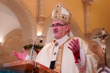 Cardeal Pierbattista Pizzaballa, patriarca latino de Jerusalém, na missa da noite de Natal em Belém.