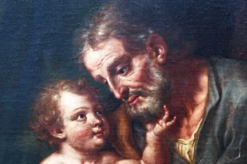 O Menino Jesus olhando com ternura para o grande são José.