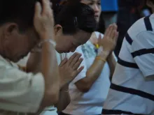 Chineses rezando