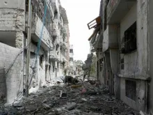 Edifícios da cidade de Homs em ruínas depois dos contínuos ataques.