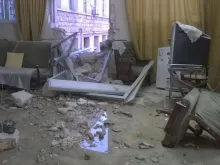 Parte de escola católica bombardeada com mísseis em Alepo (Síria) 