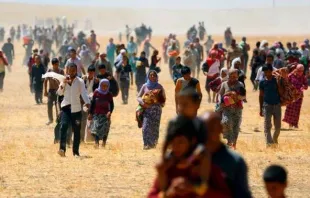 Pessoas fugindo do Iraque