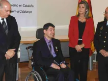 Juan José Salas junto com o Ministro do Interior, Jorge Fernández Díaz (à esquerda) e outros funcionários da Polícia Nacional.