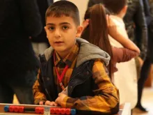Um dos meninos refugiados na Turquia que se reuniu com o Papa Francisco.