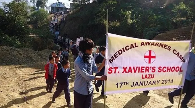 Students_lead_Medical_Awareness_Campaign_March_Lazu_2014_Credit_Diocese_of_Miao_CNA_1_24_14.jpg ?? 