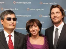 Christian Bale junto a Chen Guancheng.